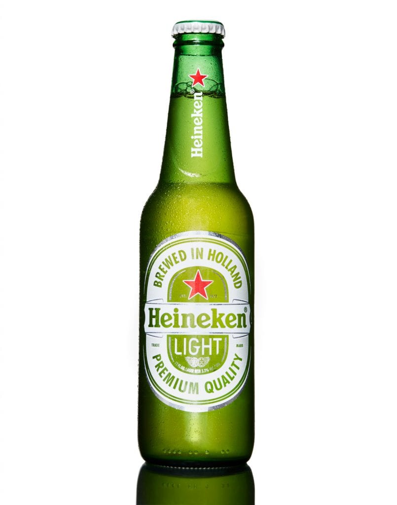 merge full shot of heineken bottle on white
