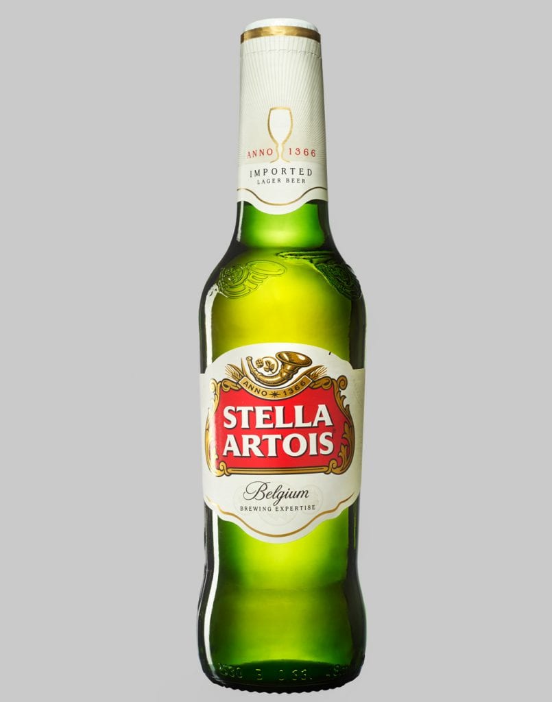 merge full shot of Stella Artois bottle on gray