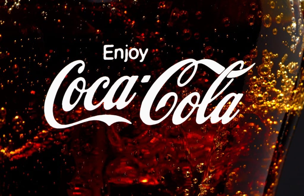 merge Close up of Coca-Cola logo on glass