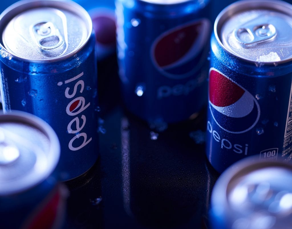 merge group shot of Pepsi can