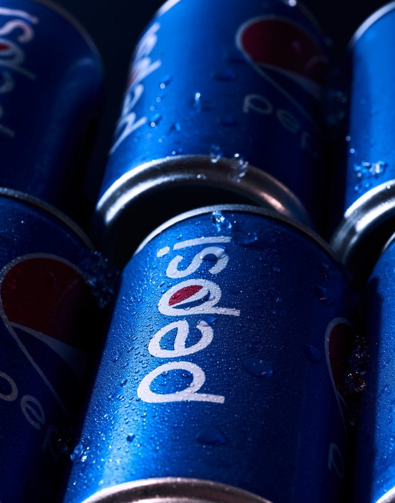 merge Close up of Pepsi can